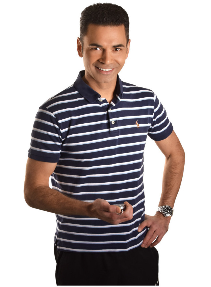 Peter Juhle als Personal Trainer mit Stoppuhr